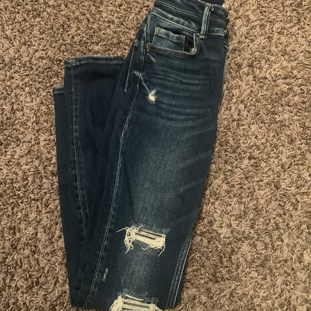 Buckle bridge high waist skinny jeans